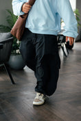 Load image into Gallery viewer, Loose-fit cotton twill cargo pants.